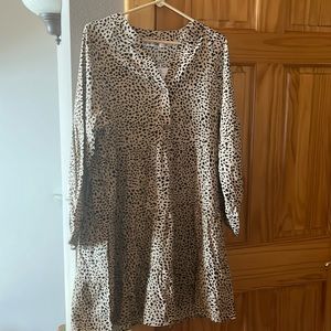 Brand NEW w/tags!! Cheetah print dress with long sleeves with elastic cuffs.